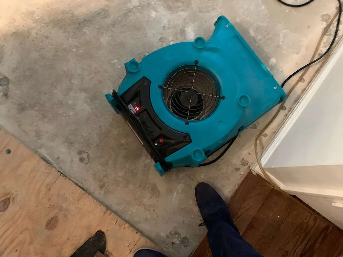 Air mover drying subfloor during Leak Detection & Repair in Chambersburg